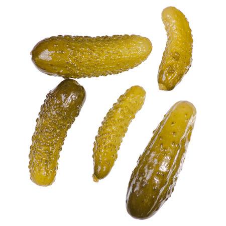Cucumbers salted on a white background isolation, top viewの写真素材
