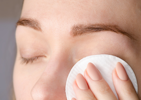 Female eye natural beauty medicine cotton pads macroの写真素材