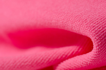 Pink towel microfiber macro textile blurred backgroundの写真素材