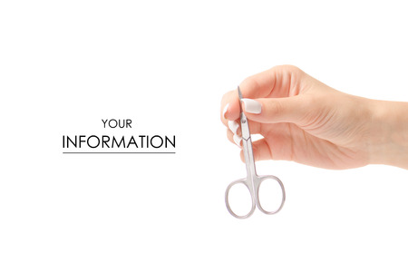 Manicure scissors in hand pattern on white backgroundの写真素材
