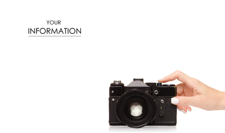 Camera old black in hand pattern on white background isolationの写真素材
