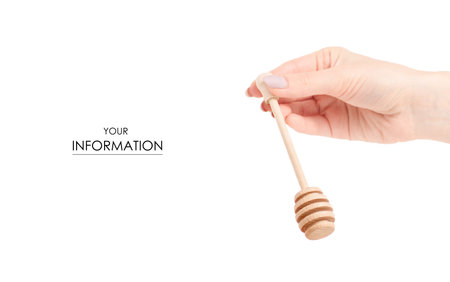 Spoon for honey in hand pattern on a white background isolationの写真素材