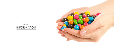 Bucket Nuts in a multi-colored glaze dragee in hand pattern on a white background isolationの写真素材