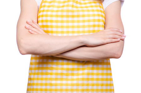 Woman in apron on white background isolationの写真素材