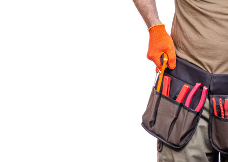 Construction belt on a man tool belt builder on a white background isolationの写真素材