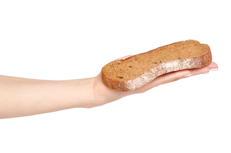 Bread sliced brown in hand on white background isolationの写真素材