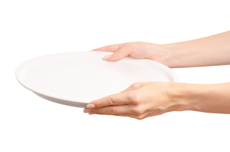 White dish empty in hand on white background isolationの写真素材