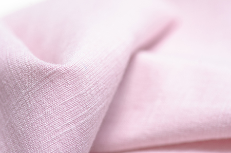 Fabric clothing flax pink macro on blur backgroundの写真素材