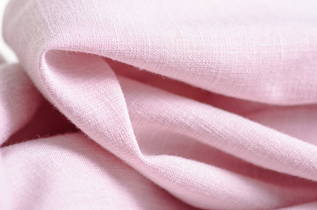 Fabric clothing flax pink macro on blur backgroundの写真素材
