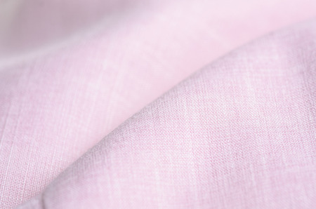 Fabric clothing flax pink macro on blur backgroundの写真素材