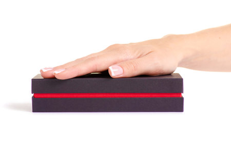 Black box in hand on white background isolation