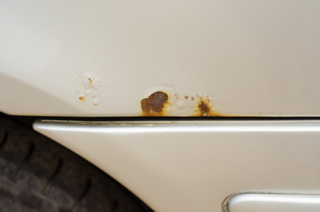 Car rust on the street repairing tintの写真素材