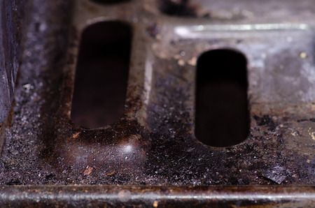 Old rusty oven macro in the kitchenの写真素材