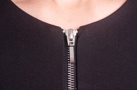 Woman in black jacket zipper macro fabric textile clothes fashionの写真素材