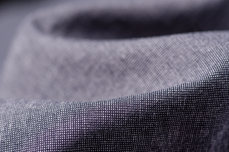 Gray fabric cloth macro clothing on blur backgroundの写真素材