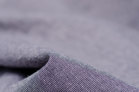 Gray fabric cloth macro clothing on blur backgroundの写真素材