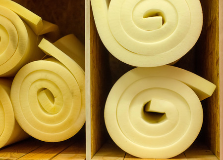 Foam in rolls on the shelf of the storeの写真素材