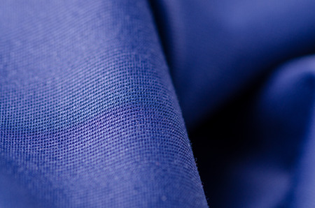 Blue purple fabric cloth macro clothing on blur backgroundの写真素材