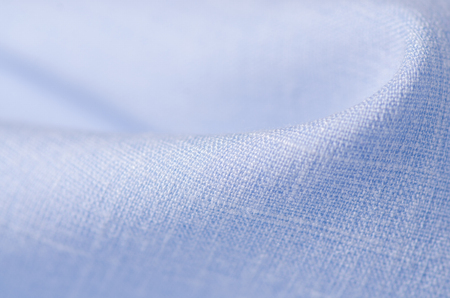 Blue fabric linen clothing on blur backgroundの写真素材