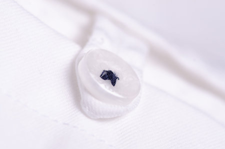White shirt material fabric fashion button macro blur background