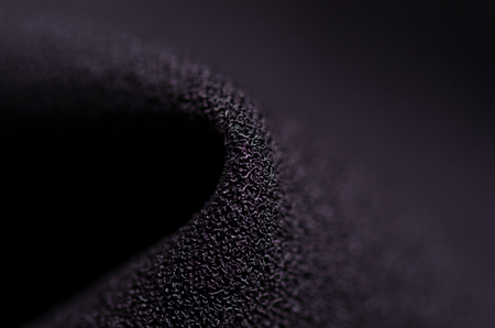 Black fabric material texture macro blur backgroundの写真素材