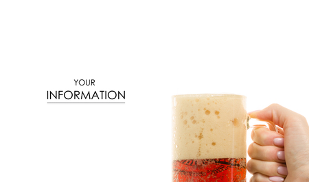 A glass of kvass in a female hand pattern on a white background isolationの写真素材