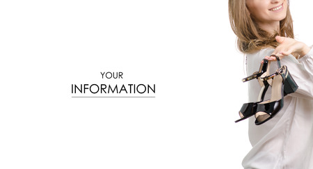 Beautiful woman with black shoes sandals in hands beauty sale buy shop pattern on a white background isolationの写真素材