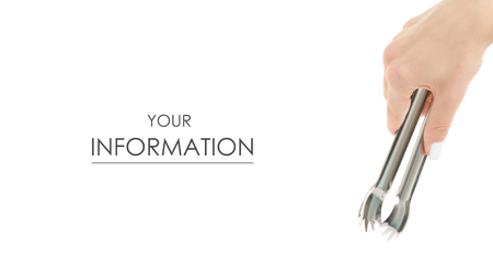 Female hands with kitchen tongs pattern on white background isolationの写真素材