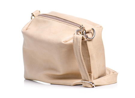 Female beige leather bag on white background isolationの写真素材