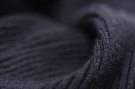 Black sweater fabric textile material texture macro blur background