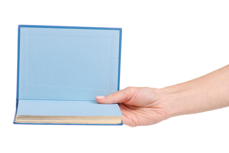 Book in hand on white background isolationの写真素材
