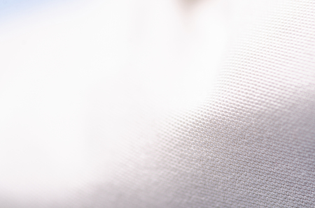 White fabric cloth material texture textile macro blur backgroundの写真素材