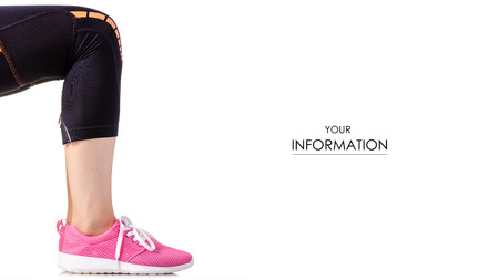 Female legs sports leggings sneakers sports exercises pattern on a white background isolationの写真素材