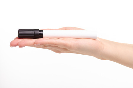 Black marker in hand on a white background. Isolationの写真素材