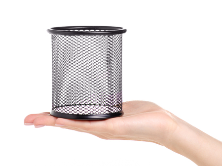 Stand stationery for pens in hand on a white background. Isolationの写真素材