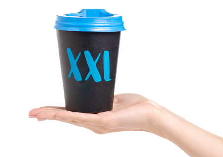 Cup of coffee XXL with a lid in a hand on a white background isolationの写真素材