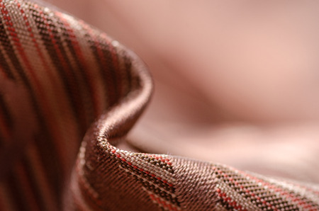 Beige brown red fabric texture material fashion carpet on blur backgroundの写真素材