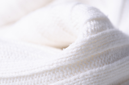 White warm fabric texture material sweater on blur backgroundの写真素材