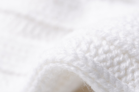 White warm fabric texture material sweater on blur backgroundの写真素材