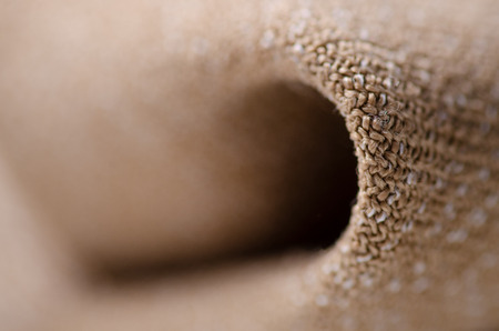 Beige brown fabric texture material fashion on blur backgroundの写真素材