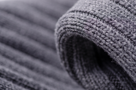 Gray sweater fabric texture textile warm cloth macro blur backgroundの写真素材