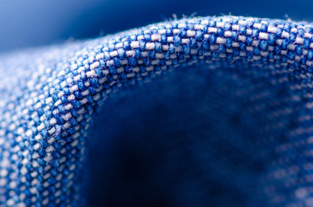 Blue jeans material fabric texture fashion seam fittings macro blur background