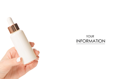 Bottle with cosmetics serum hyaluronic acid in hand pattern isolated on white background.の写真素材