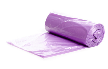 Garbage bags roll isolated on a white background.の写真素材