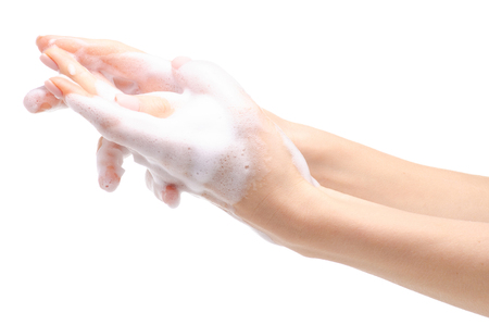Soap hands in the foam beauty health isolated on a white background.の写真素材