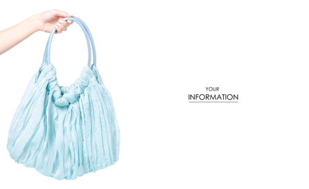 Female blue bag in hand pattern isolated on white background.の写真素材