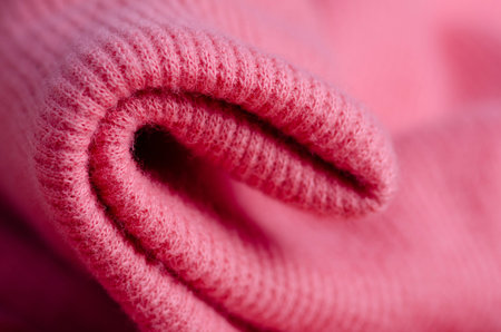 Fabric warm pink sweater textile material texture blur background macro
