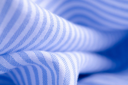 Fabric blue white strip cloth textile material texture blur background macroの写真素材