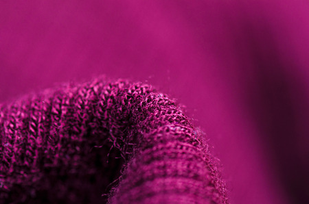 Fabric warm purple pink lilac sweater textile material texture blur background macroの写真素材