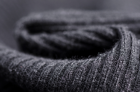 Fabric warm black sweater textile material texture blur background macroの写真素材